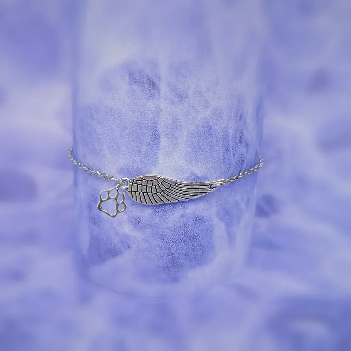 Women’s Charm Bracelet with Wing and Paw Print Design 5